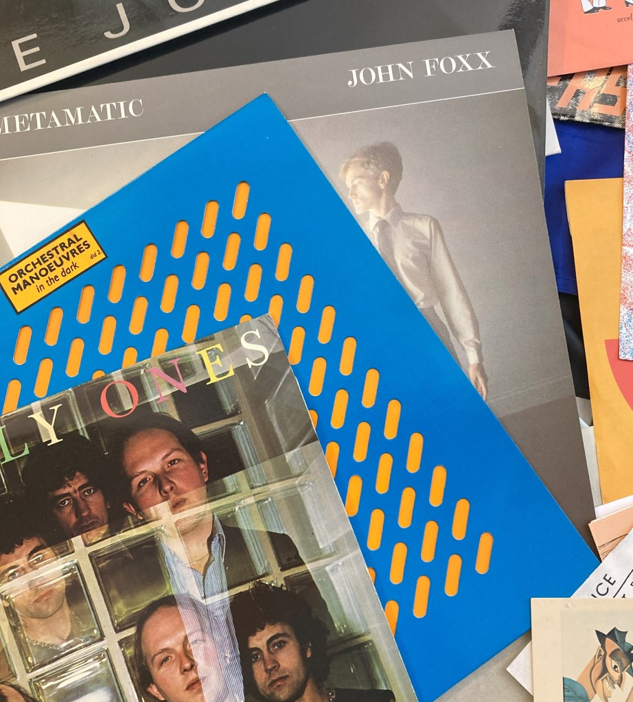 Album covers: Orchestral Manoeuvres in the Dark 1st album & John Foxx, Metamatic.