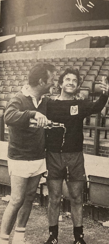 Clough & Taylor throwing away cigarettes and alcohol in Nottingham Forest photo shoot.
