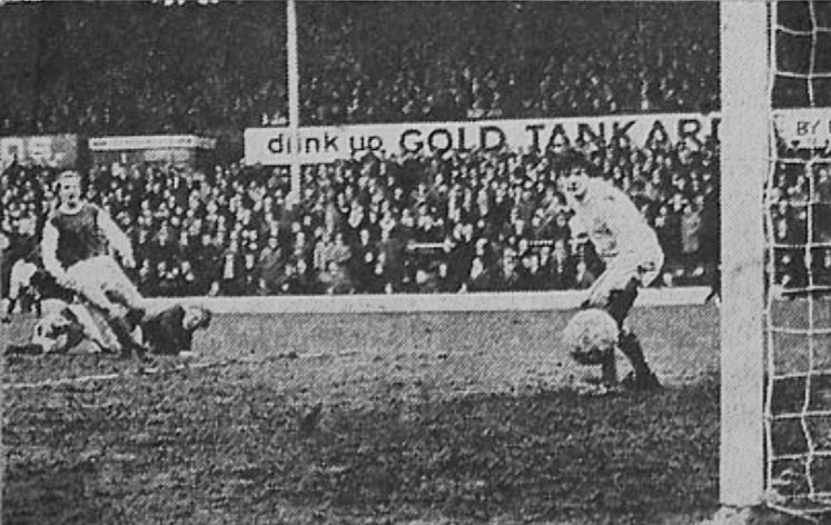 Peter Cormack in goal for Hibs.