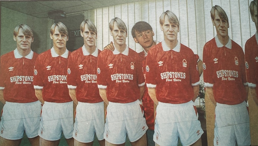 Stuart Pearce with a number of Stuart Pearce cardboard cut outs.