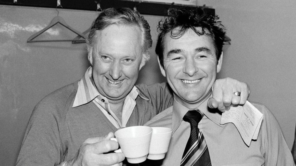 Clough and Taylor sharing a cuppa.